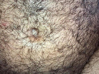 Cock chest nipples feet in close-up