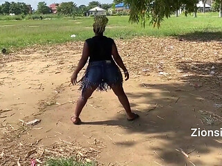 African Ebony Sexy Black Girl Dances in Public with Laughter