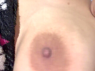 Mom bounces and plays with her huge tits