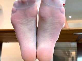 Cute teen girl enjoys foot fetish