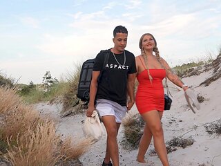 Couple has sex on the beach with a beautiful view