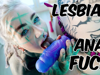 Goth babe with pierced pussy enjoys strap-on anal sex