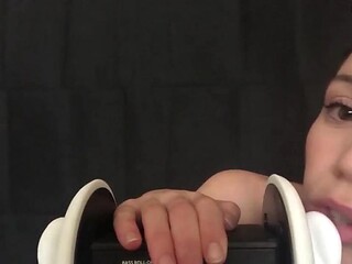 Amateur girlfriend Lexi Poll gives a sensual ASMR ear licking session with