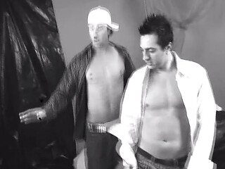Seductive brunette in fishnet sucks cock and licks pussy backstage