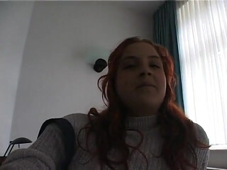 Hairy redhead bbw fingers her pussy on the bed