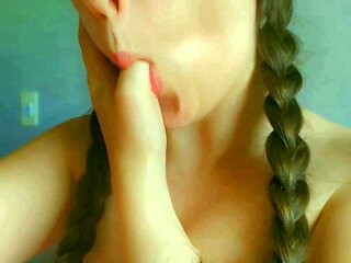 nasty and insane schoolgirl displaying her tongue , jaws watering and onanism