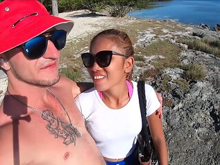 Asian babe gives a steamy blowjob on sunny beach wearing her sexy glasses