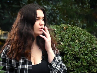 Sweet and Busty Russian Babe Smoking Cigarette in Nature