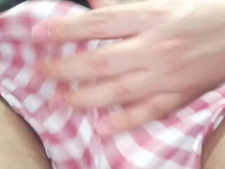 Young man touching himself while taking out eggs