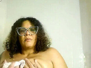 Chubby MILF chats and gets naked in the bathtub