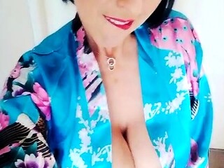 Busty curly brunette with big boobs fucks on couch