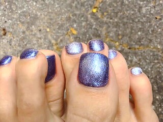 Brunette with foot fetish rubs big dick with her feet in POV