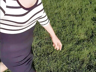 Risky outdoor piss on picknick bench