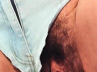 Blonde Stuffs Her Hairy, Big Pussy with Her Dildo