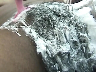Shaved MILF rides and sucks in horny bedroom session