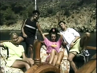 Sexy vintage MILFs enjoy anal fucking on a yacht
