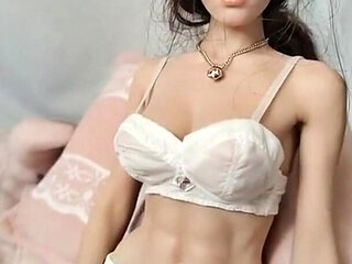 Cynthia Undresses on Bed