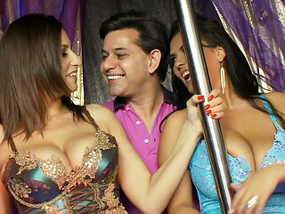 Three horny men are surrounded by a crowd of beautiful women.