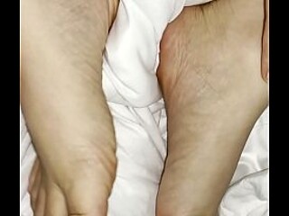 Petite Asian babe gives foot massage in ASMR clip