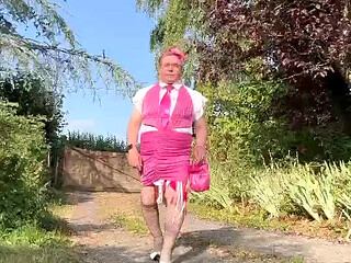 Dressed in a tight pink dress for an evening out
