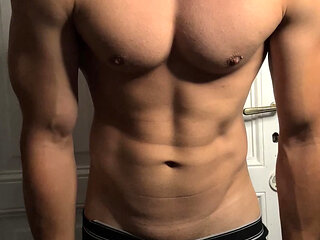 Young bodybuilder teasing in tight underwear
