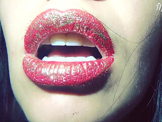 Red lips with golden glitter