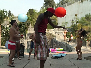 Busty Asian cutie gets a hard black cock pounding by the pool