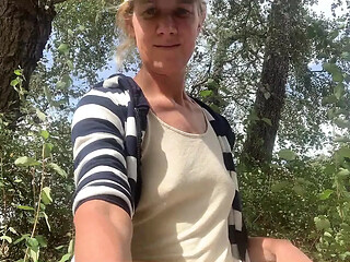 EUROPEAN MILF FLASHES TITS OUTDOORS