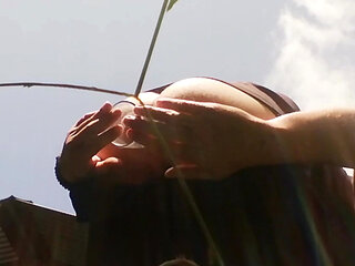 Young boyish man opens his ass