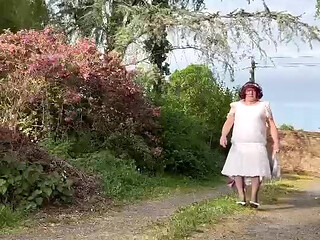 Dressed in a white lace dress for a day