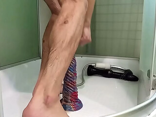 I jump on a big dildo and squirt from my dick