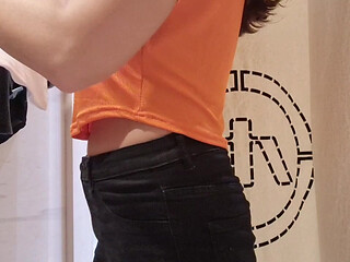 flashing tits in the fitting room with the curtain open