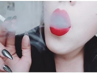 Mistress With Luscious Red Lips Close-up Smoking Cigarette