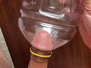 Masturbator using firm plastic bottle to suck and fuck