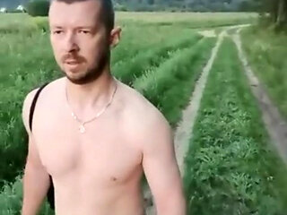 Naked walk of a Russian man in nature