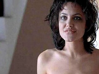 Angelina Jolie gives a sultry performance in this hardcore scene.