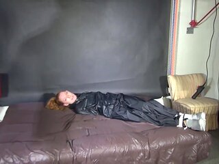 ***Ronja*** Being Overwhelmed, Tied And Gagged With Ropes And A Clothgagged From Stella Both Wearing Sexy Shiny Nylon Rain- And Downwear (Video)