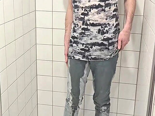 Playing in shower fully clothed in jeans and chucks