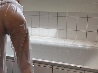 Sue, Cleaning the Bathroom in a Pvc Suit!