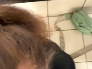 Petite white slut gives a public blowjob in the mall bathroom