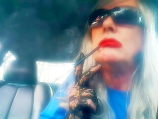 DOMMIE MOMMY SMOKING LONG CIGARETTES IN A HOLDER