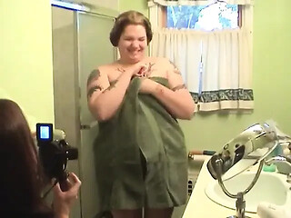 Tattooed cutie strips and washes her big tits and juicy cunt in the shower.