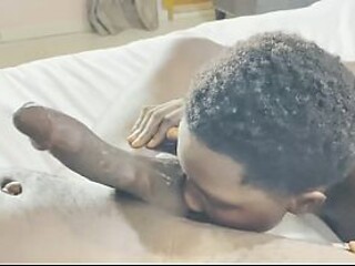 Sexy African teen gives a hot and steamy blowjob to her neighbor's big dick.