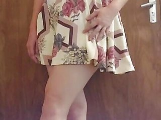 Playful in sexy dress gets the urge masturbating