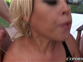 Blonde bombshell Bridgette B shows off her huge butt while getting a