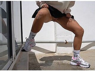 College Girl In A Miniskirt Pees