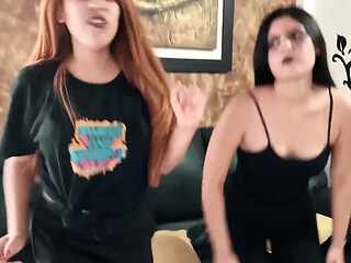 Domina zombie laughs while taping mask on victim's face for trick or treat game
