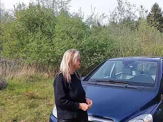 Granny with Big Natural Tits Plays with Her Breasts in Car