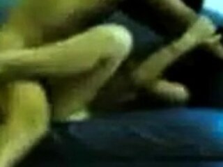Amateur Asian Couple on a Blue Sofa