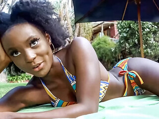 Cute ebony babe gives sloppy head and rides big white cock outside